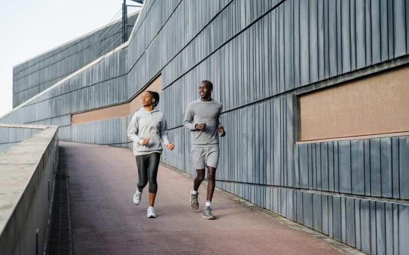 a man and a woman jogging